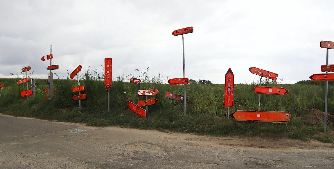 ‘Spheres, Portals & Legends’, paint marker and stickers on stripped deviation signs (also offering reflections at night), former Walter artist Willem Vermeersch, @ Kunst & Zwalm, 2021